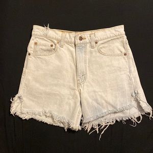 Vintage 80’s Levi’s cut off shorts 512 high-rise waist faded and fringed by age